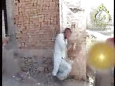 Taliban executing male by shooting him in the face