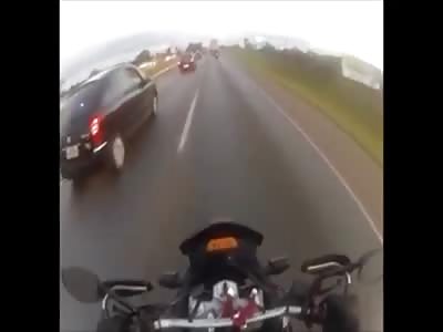 Exact moment when a tire hits a motorcyclist