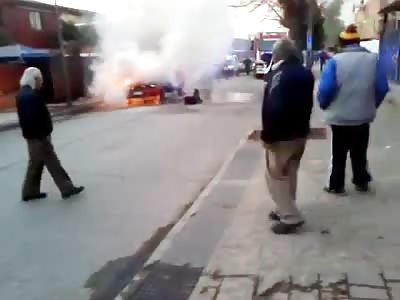 TOTALLY STONED GUY TRYING TO EXTINGUISH FIRE OF A CAR
