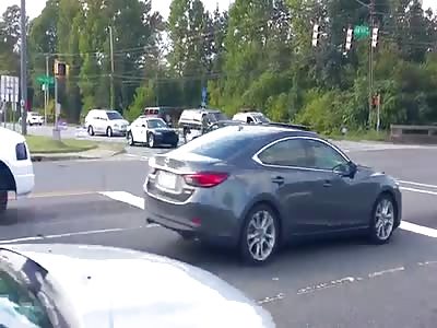 TOTALLY CRAZY: WOMAN DOES DONUTS IN BUSY INTERSECTION 