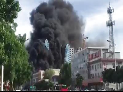 BUILDING IN CHINA FIRES COMPLETELY IN SECONDS