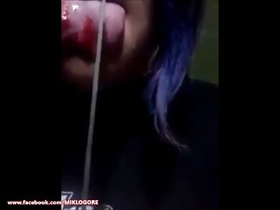 woman's tongue is cut with knife