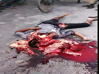 Accident aftermath. Horrific scene *GRAPHIC* .. A man started cleaning body parts towards the end with his hands.. 