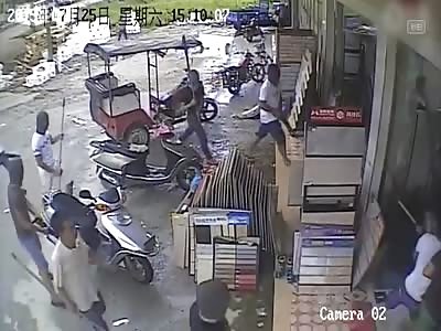 20 hired thugs with sticks and blades storm store 