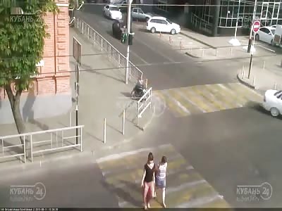 Car Hits Elderly Woman on a Wheelchair 