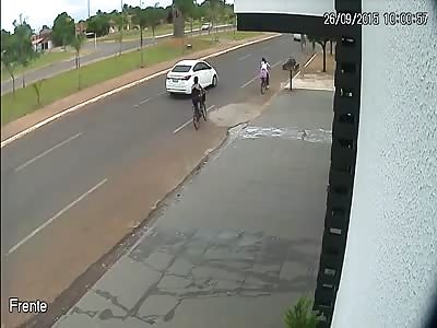 CCTV footage shows moment female cyclist struck by car