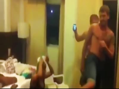 Dude Tries To Kick A Bottle Off Of His Girlfriends Head 