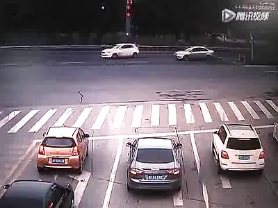 Car cutting traffic gets pushed by truck 