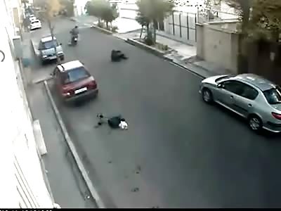 woman being dragged down the street