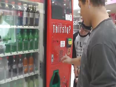 Thieves show you how to get free soda from a vending machine.
