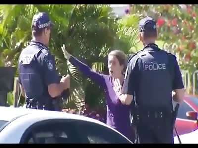 Woman throws dog shit at cops