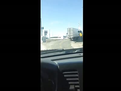 Truck Trampled by Train Carrying Military Vehicles