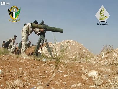  Syrian patriots engage and destroy an assad puppet regime 2S1 Gvozdika, with a TOW ATGM: Abtin Village (Oct 18th, '15)