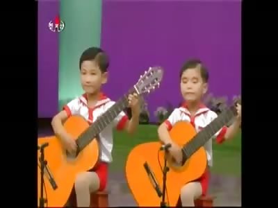 North Korean Children Playing Guitar