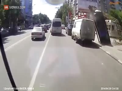 Falling crane misses crushing a pedestrian by just inches.