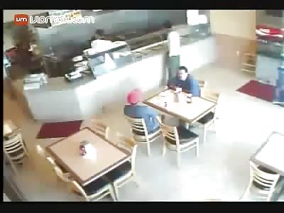 Brutal brawl breaks out inside of a restaurant.