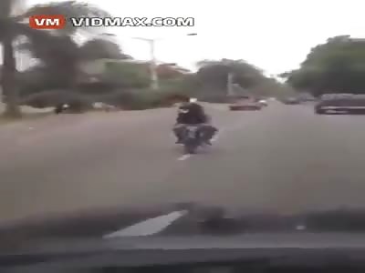Chinese girl briefly learns how to fly after attempting to show off on her motorcycle