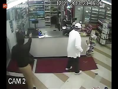 Store Clerk snatches Robbers gun and Chases him out of the store