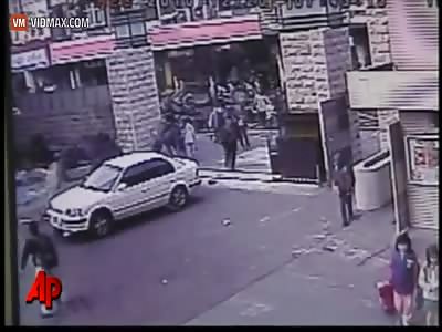 CCTV films a 67yr old Taiwanese man running over students before the car explodes