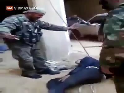 ISIS Fighters brutally beat a man, then lights his head on fire