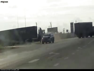 Two trucks, One Rope ,One unlucky Bastard